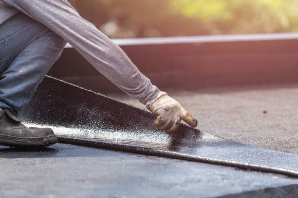 Professional Basement Waterproofing technician working in Lakeland, TN